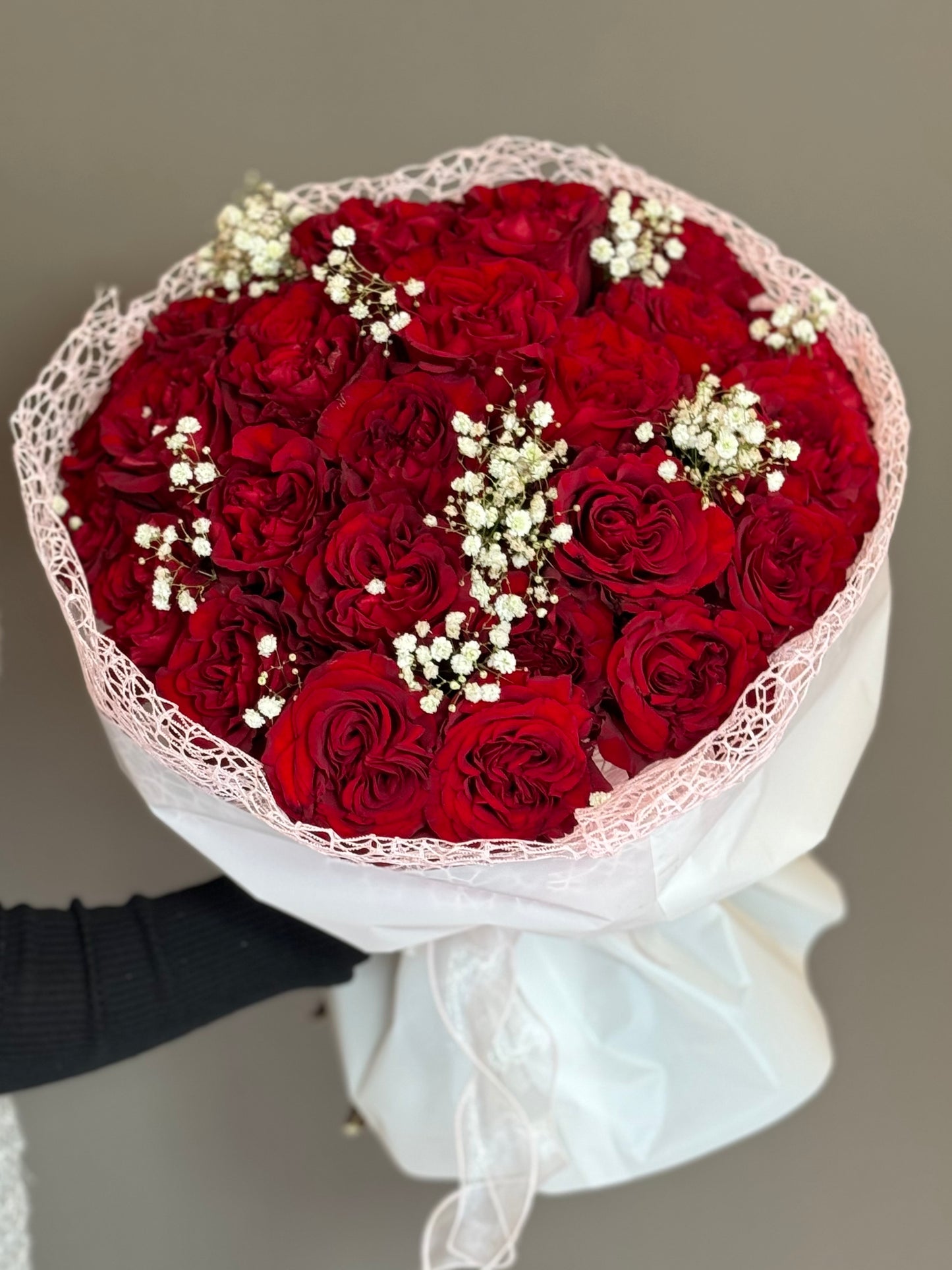 Red Hearts Roses. 25 stems and White Gypsophillia.