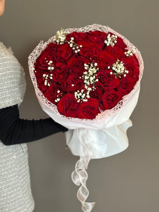 Red Hearts Roses. 25 stems and White Gypsophillia.