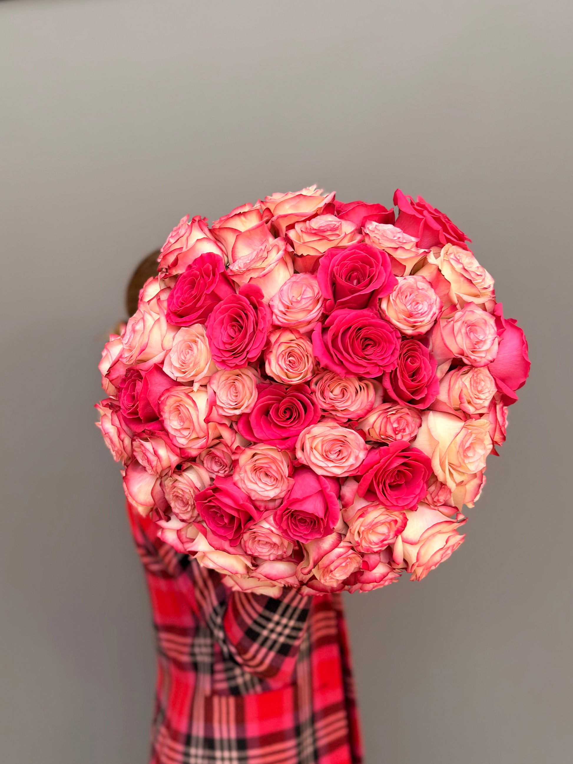 Extra-large luxury artisan flower bouquet featuring a dense dome of premium hot pink and cream-rose bicolor Ecuadorian roses by Lapin Flowers. Upscale grand floral delivery for Bethesda Maryland, Potomac, and Washington DC.⁠