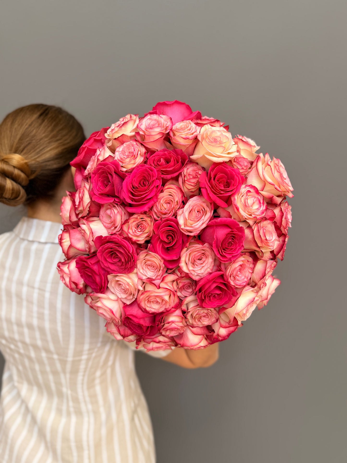 Extra-large luxury artisan flower bouquet featuring a dense dome of premium hot pink and cream-rose bicolor Ecuadorian roses by Lapin Flowers. Upscale grand floral delivery for Bethesda Maryland, Potomac, and Washington DC.⁠