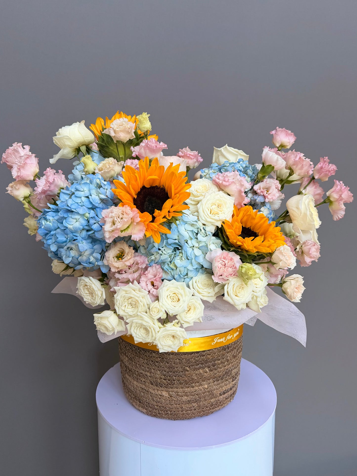 Tuscan Sunrise Basket luxury sunflower and blue hydrangea arrangement delivery Potomac MD Bethesda McLean Lapin Flowers