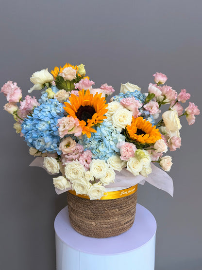 Tuscan Sunrise Basket luxury sunflower and blue hydrangea arrangement delivery Potomac MD Bethesda McLean Lapin Flowers