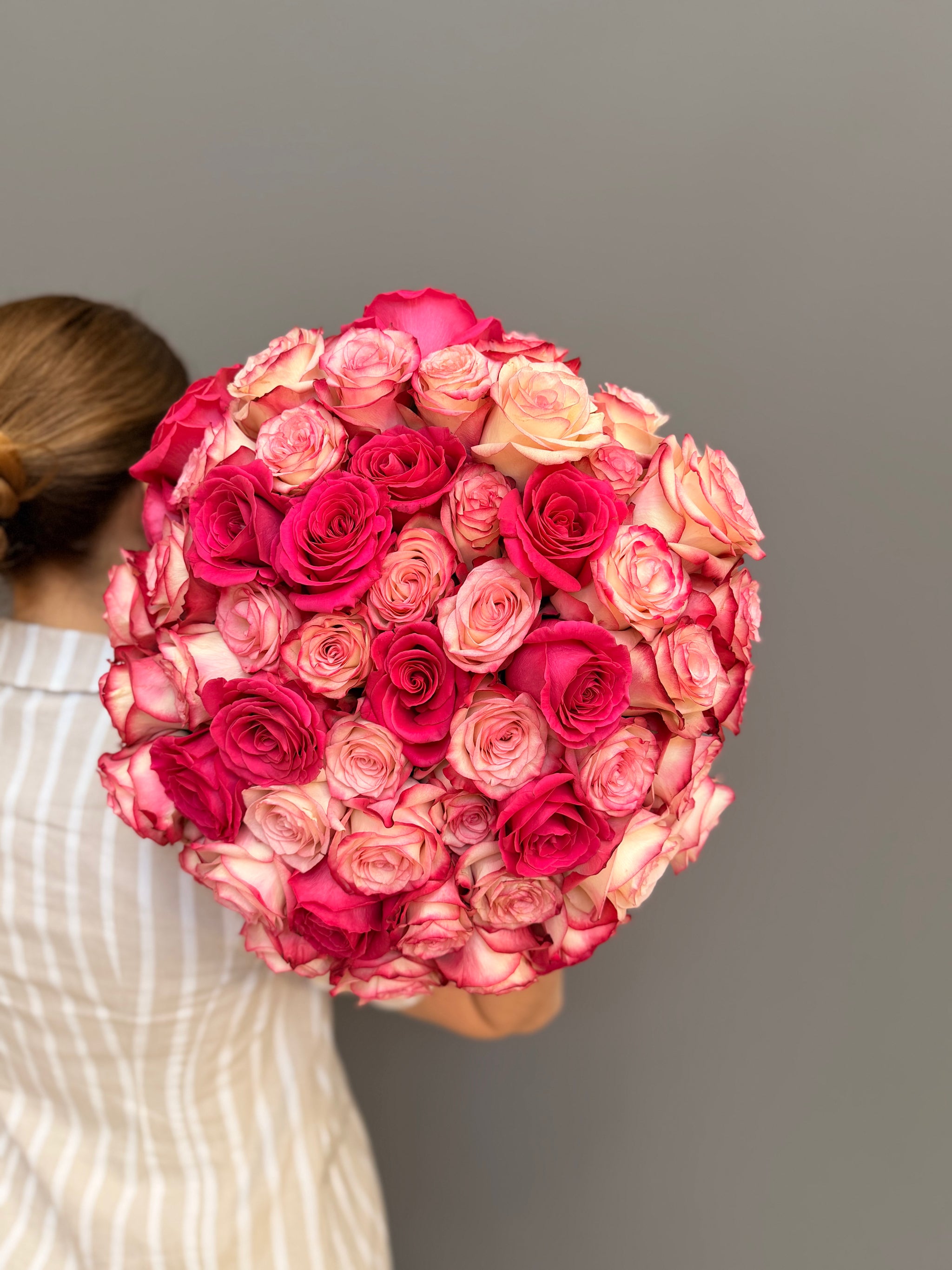 Extra-large luxury artisan flower bouquet featuring a dense dome of premium hot pink and cream-rose bicolor Ecuadorian roses by Lapin Flowers. Upscale grand floral delivery for Bethesda Maryland, Potomac, and Washington DC.⁠