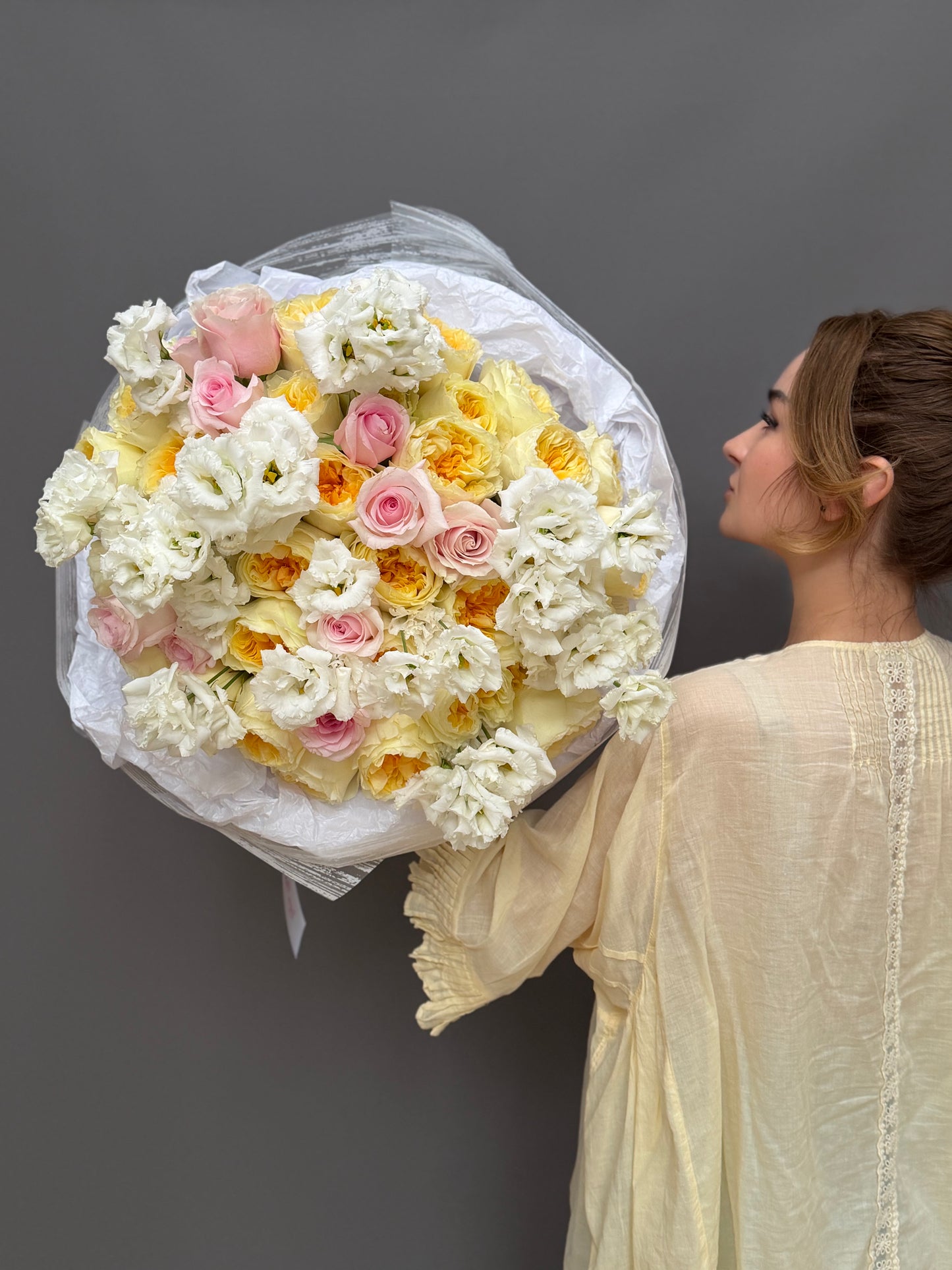 Luxury peach garden roses and ruffled lisianthus bouquet by Lapin Flowers high end flower delivery Washington DC Georgetown McLean VA⁠